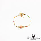 Bracelet en acier œil de Sainte Lucie et perles de résines