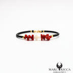 Bracelet jonc en caoutchouc avec corail cupolino et croix en nacre